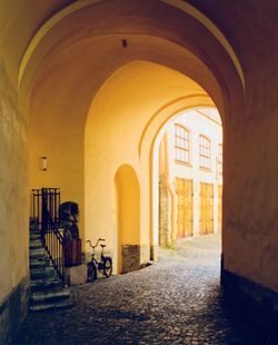 Man in corridor of building