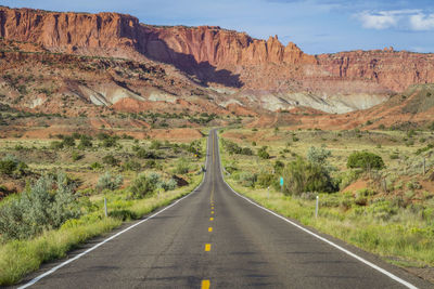 Road leading towards mountains