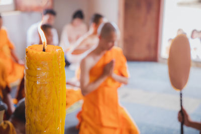 Close-up of candle in temple