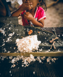 High angle view of girl holding ice cream