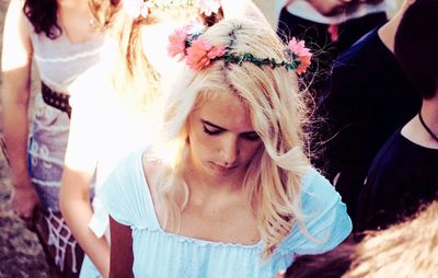 High angle view of young woman looking down