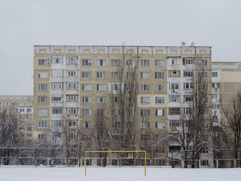 View of frozen building in winter