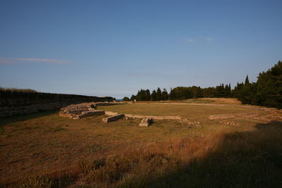 Scenic view of land against clear sky