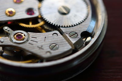 High angle view of clock on table