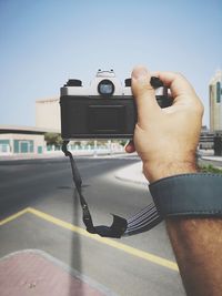 Man photographing with camera