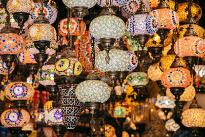 Full frame shot of multi colored illuminated lantern for sale in market