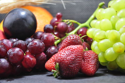 Close-up of grapes on table