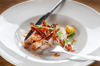 High angle view of pasta in plate on table