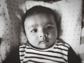 Portrait of cute baby at home