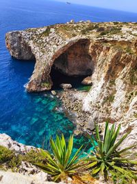 Scenic view of rock formation in sea