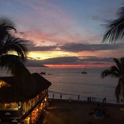 Scenic view of beach against sky during sunset