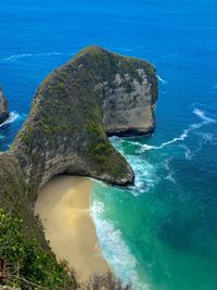 High angle view of rock formation in sea