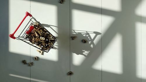 Close-up of electric lamp hanging on ceiling