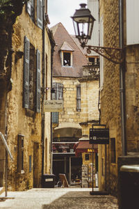 Exterior of houses in city against sky