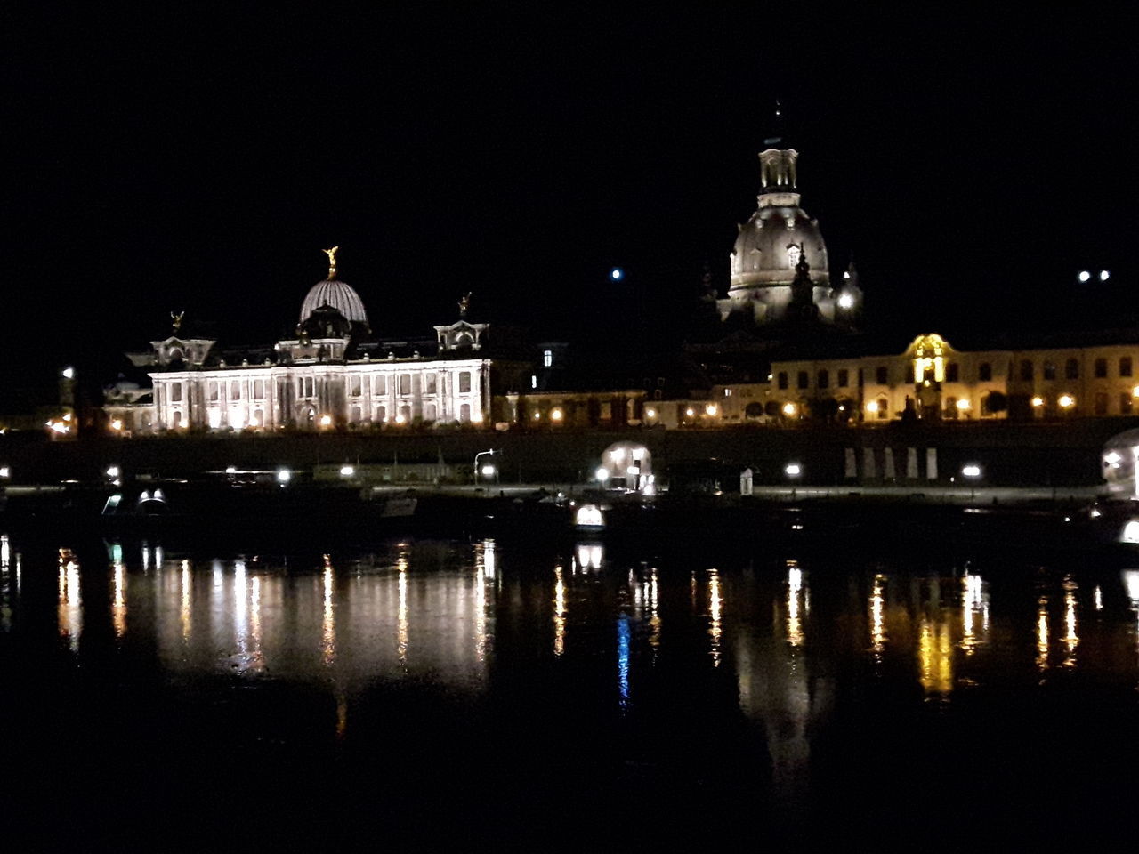 REFLECTION OF BUILDINGS IN WATER