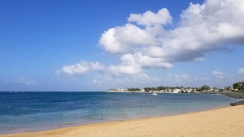 Scenic view of beach against sky