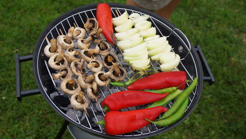 High angle view of red mushrooms in basket