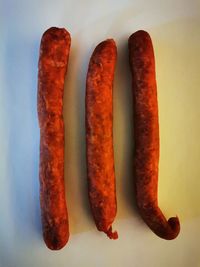 Close-up of meat against white background