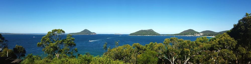 Scenic view of sea against clear sky