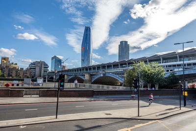 View of buildings against cloudy sky