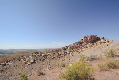 Scenic view of mountain against clear blue sky