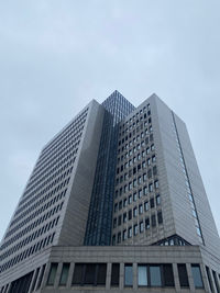 Low angle view of modern buildings against sky