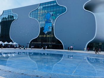 Group of people in front of building