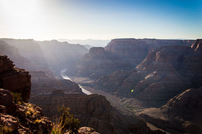 Scenic view of rocky mountains at grand canyon national park against clear sky