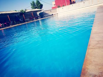 Swimming pool against blue water