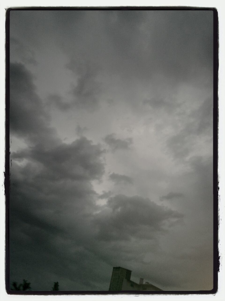 transfer print, sky, low angle view, cloud - sky, auto post production filter, cloudy, cloud, weather, built structure, overcast, architecture, building exterior, nature, beauty in nature, cloudscape, outdoors, no people, high section, day, scenics