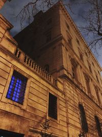 Low angle view of building against sky at night