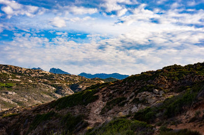 Scenic view of rocky mountains against sky