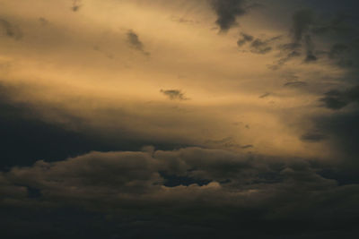 Low angle view of clouds in sky during sunset