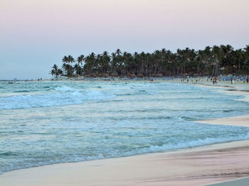 Scenic view of beach against clear sky