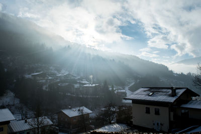 Scenic view of snow covered mountain against sky