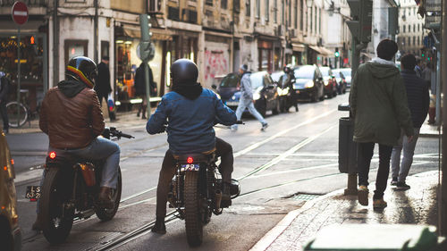 People on city street during winter