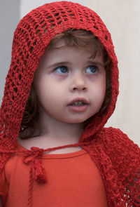 Little girl in red riding hood outfit