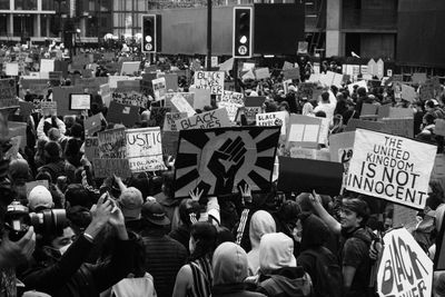 Group of people on street in city