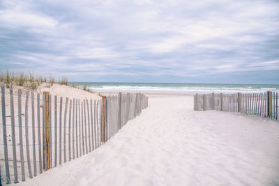 Scenic view of beach against sky