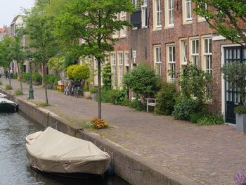 Canal amidst buildings in city