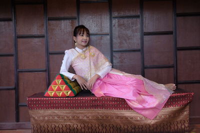 Portrait of a girl sitting outdoors