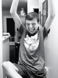 Portrait of smiling boy at home