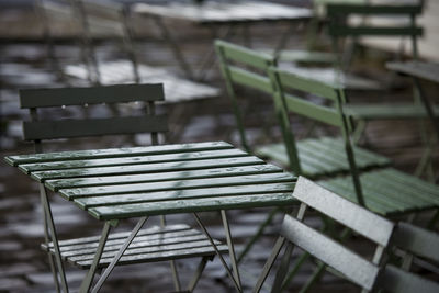 Close-up of empty chairs and table in restaurant