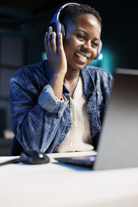 Young woman using mobile phone