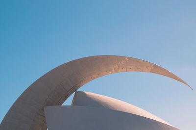 Low angle view of building against blue sky