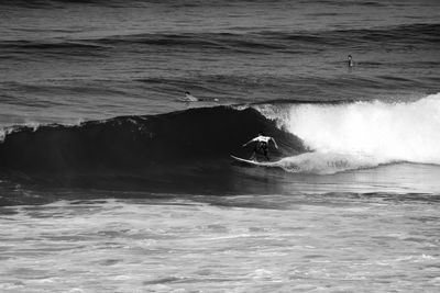 Waves splashing on shore
