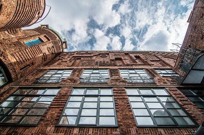 Low angle view of modern building against sky