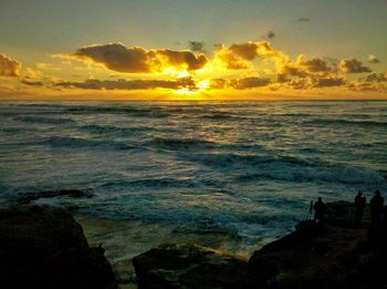 Scenic view of sea at sunset