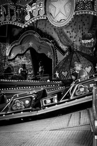 High angle view of illuminated carousel at night