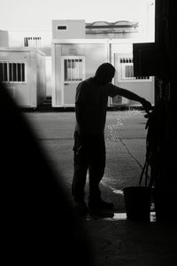 Full length of woman standing in city
